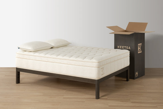 Keetsa tea leaf classic mattress on the black brushed steel bed frame.