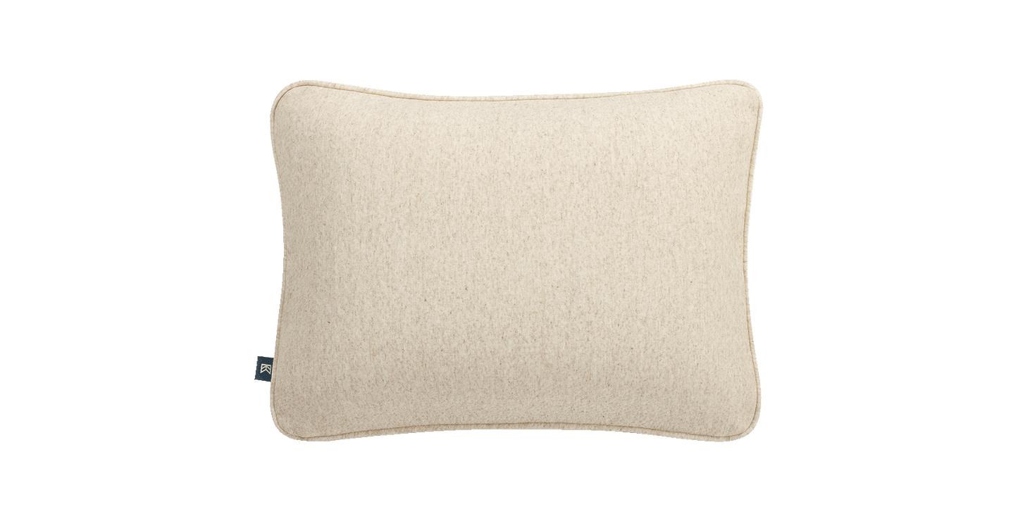 Keetsa Soft Dual Comfort Pillow angled side view displaying its gently contoured profile and even fill distribution, engineered with dual comfort construction to provide soft cushioning and reliable neck support for side and back sleepers.