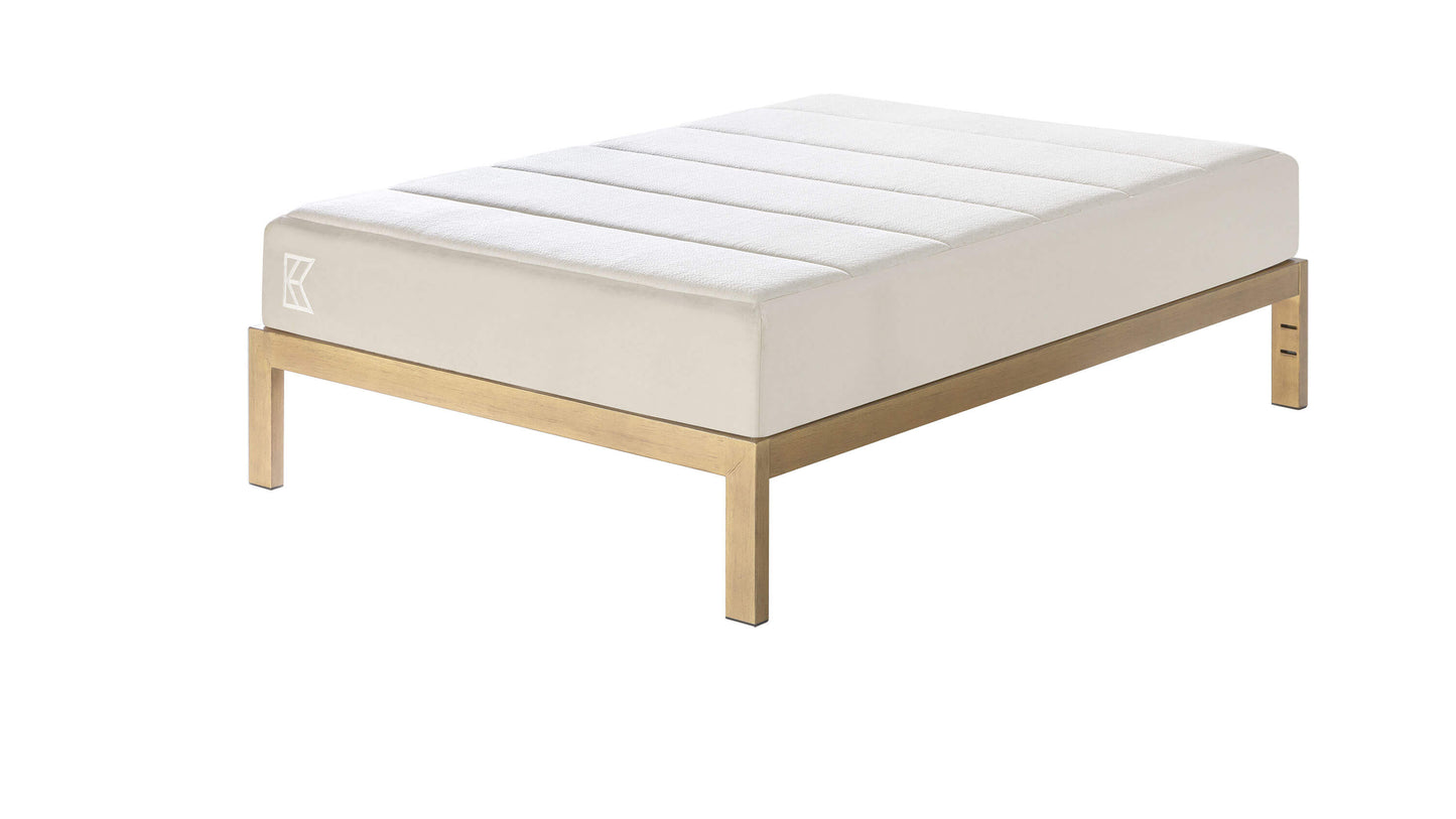 Keetsa Cloud mattress positioned on a wooden platform bed frame, illustrating its compatibility with modern foundations and its clean, structured silhouette.