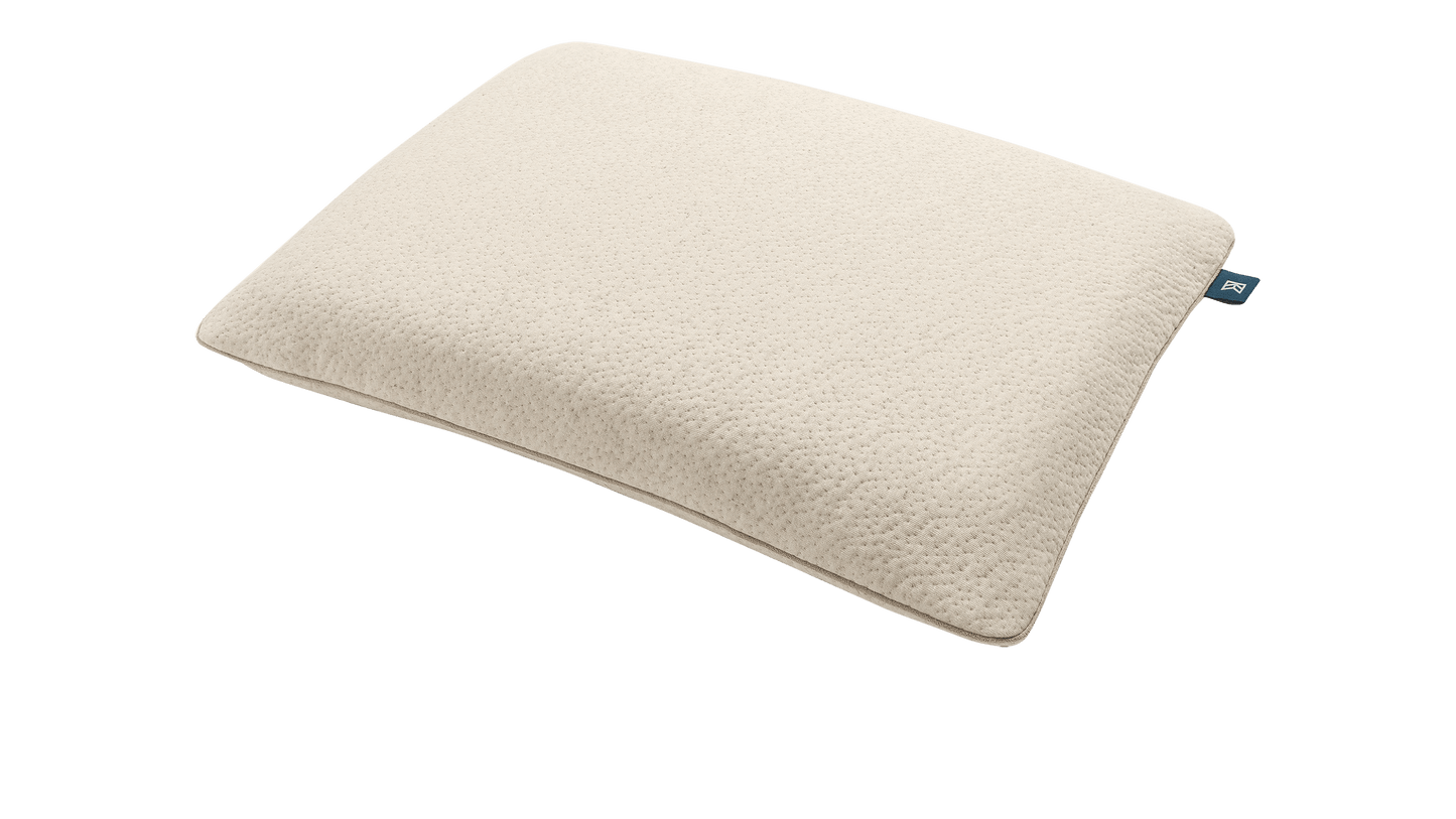 Keetsa Tea Leaf Traditional Pillow in natural beige with a softly contoured rectangular shape, designed to provide classic, balanced head and neck support using breathable, eco-conscious materials for a comfortable and supportive sleep experience.