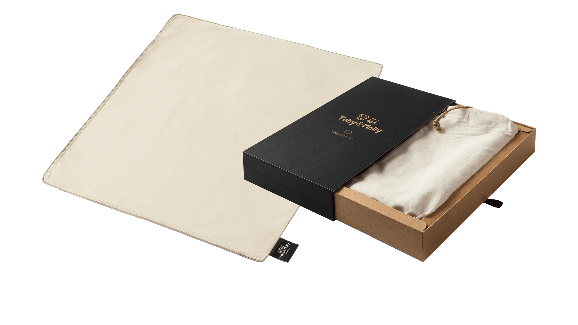 Keetsa Toby & Molly cotton pet bed cover in natural cream displayed flat beside premium gift box with black lid, gold logo, and drawstring canvas pouch inside kraft box, branded fabric tag on cover corne.