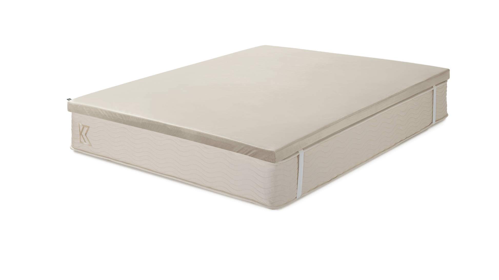 Keetsa Basic Comfort Layer mattress topper angled view displaying its slim profile and clean tailored edges, crafted to rest securely on a mattress and provide an added layer of balanced comfort and gentle support.