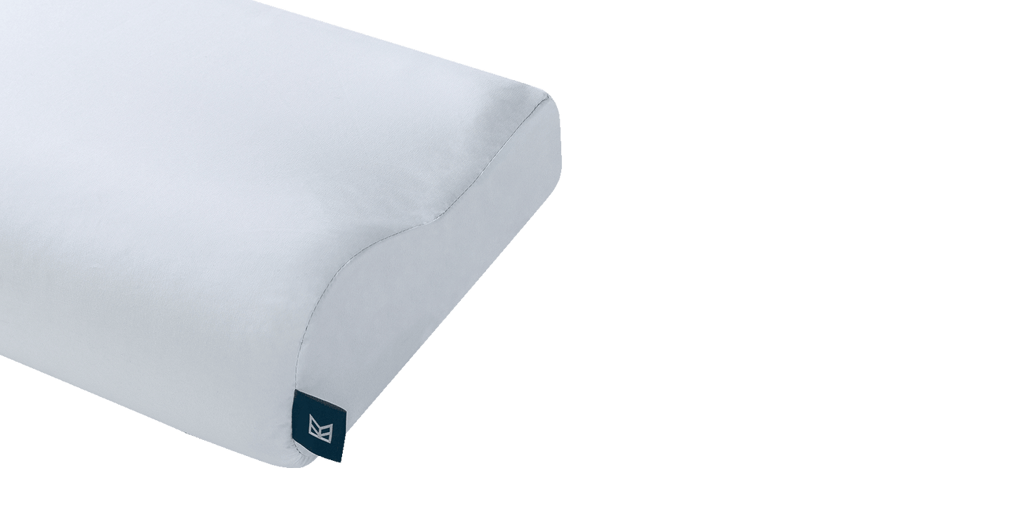 Keetsa Anti-Mite and Sweat-Resistant Pillow Protector contour style close-up showing smooth white fabric and tailored curved seams, engineered to fully encase a contour pillow for breathable, moisture-resistant protection.