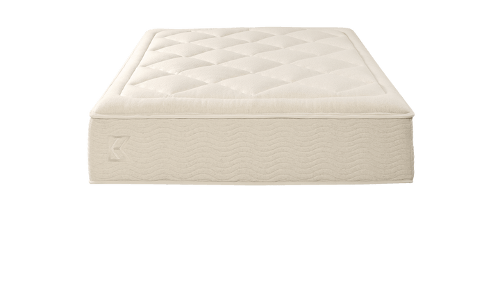 Tea Leaf Dream® mattress straight-on front view with plush quilted top and continuous wave-patterned sides, built to deliver consistent support, edge stability, and a clean, tailored profile for modern bed frames.