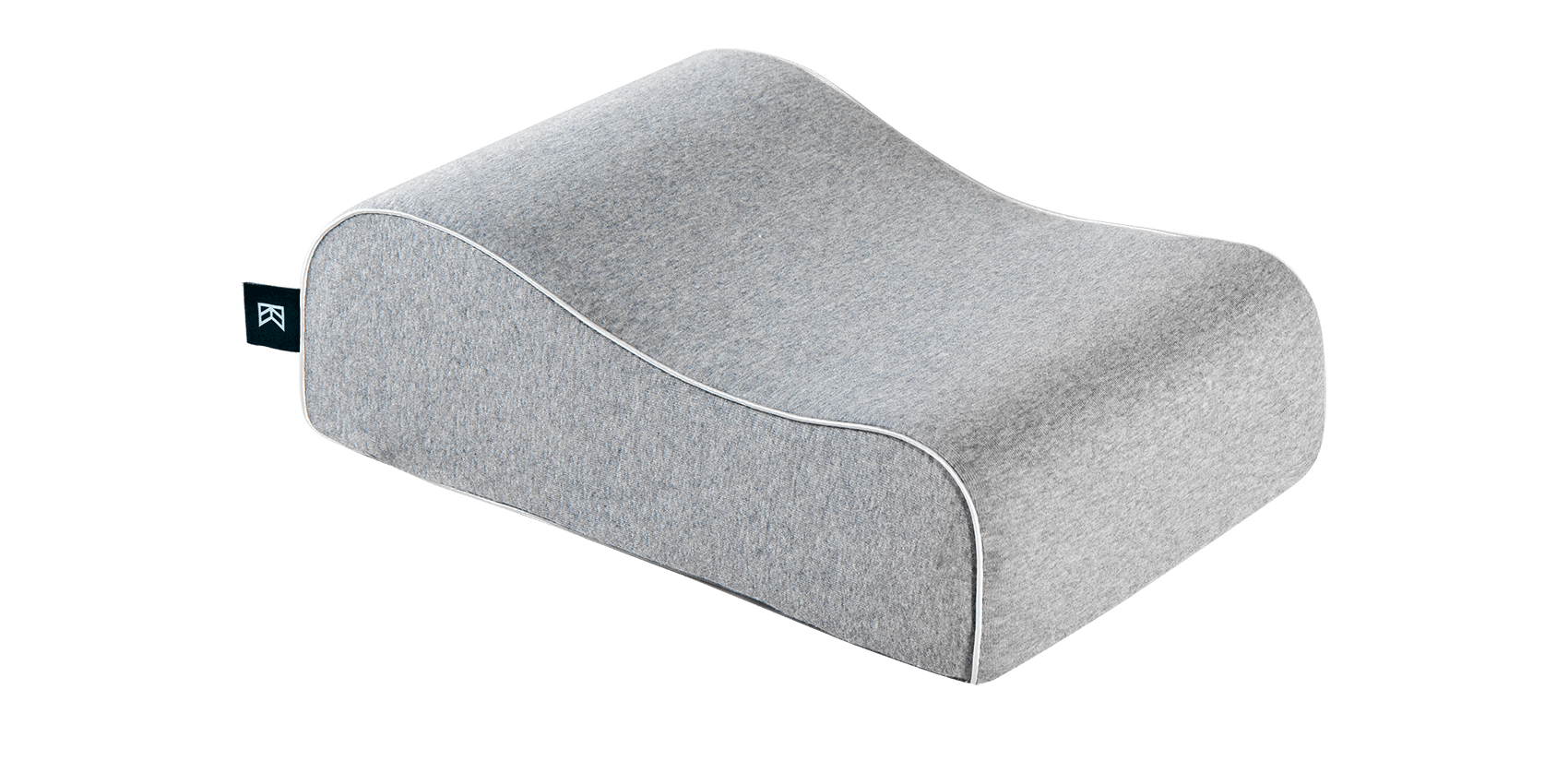 Keetsa Siesta pillow in heather gray, three-quarter view showing contoured ergonomic wave shape with white piping trim, soft jersey knit cover, and branded Keetsa tag.