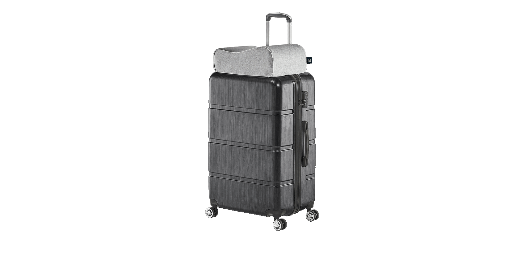 Keetsa Siesta pillow in heather gray resting on top of carry-on suitcase handle, demonstrating compact travel-friendly design for portable neck support on the go.