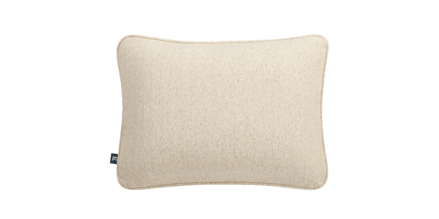 Keetsa Soft Dual Comfort Pillow angled side view displaying its gently contoured profile and even fill distribution, engineered with dual comfort construction to provide soft cushioning and reliable neck support for side and back sleepers.
