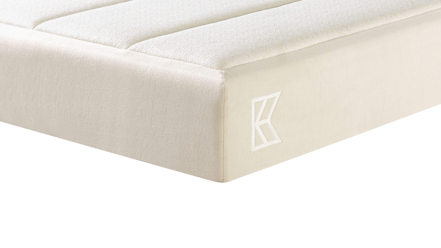 Keetsa Cloud mattress corner close-up featuring a soft, smooth cover with subtle texture and embroidered Keetsa logo, emphasizing clean tailoring and refined craftsmanship.